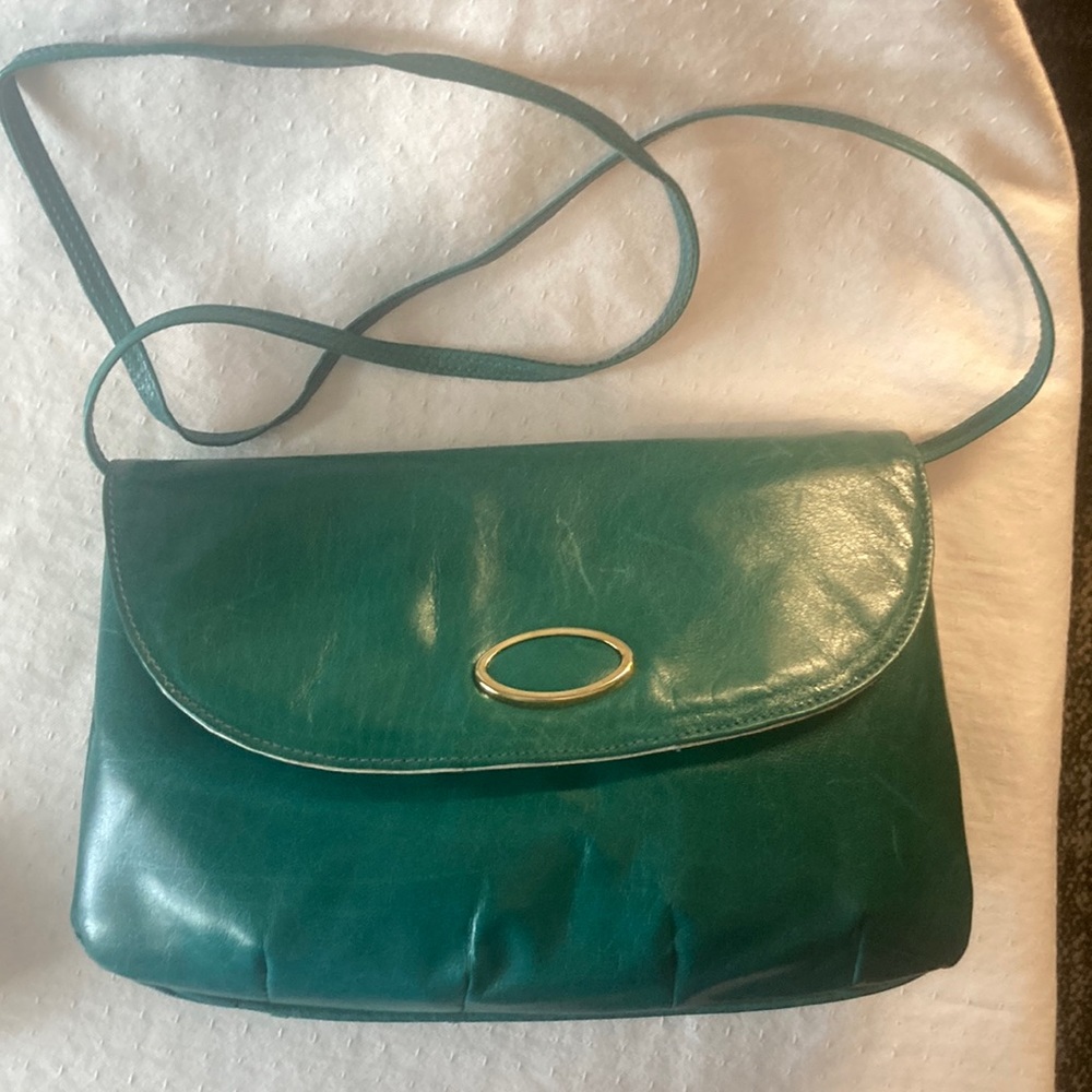Made in Italy Genuine Leather plastic lined hand bag with strap
